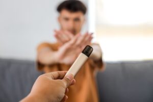 Man saying no to weed because he thinks he may be addicted to marijuana