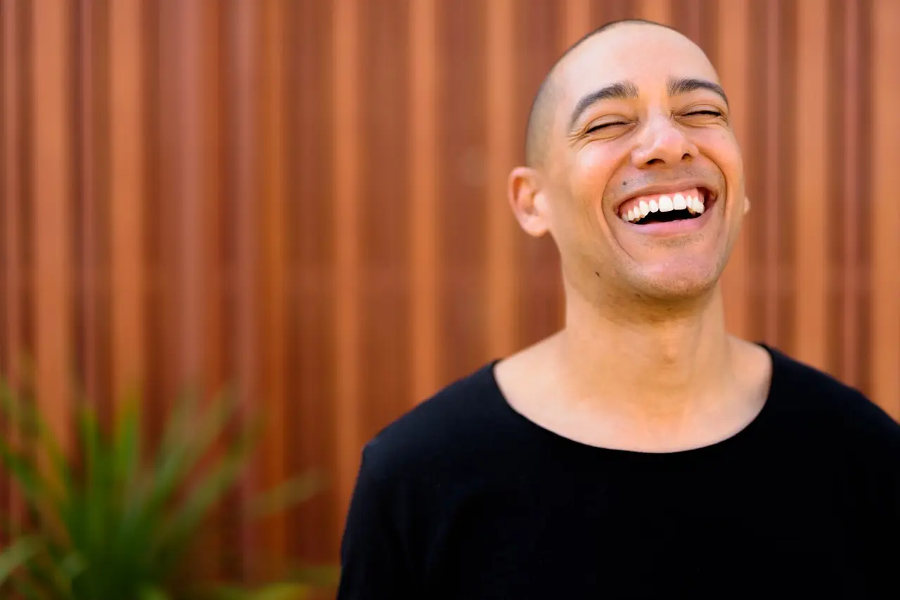 handsome multi ethnic bald man in the streets outd 2026 01 07 06 43 20 utc Large | Detox California