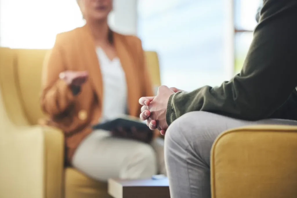 therapy session with a therapist in a sunny room | Detox California