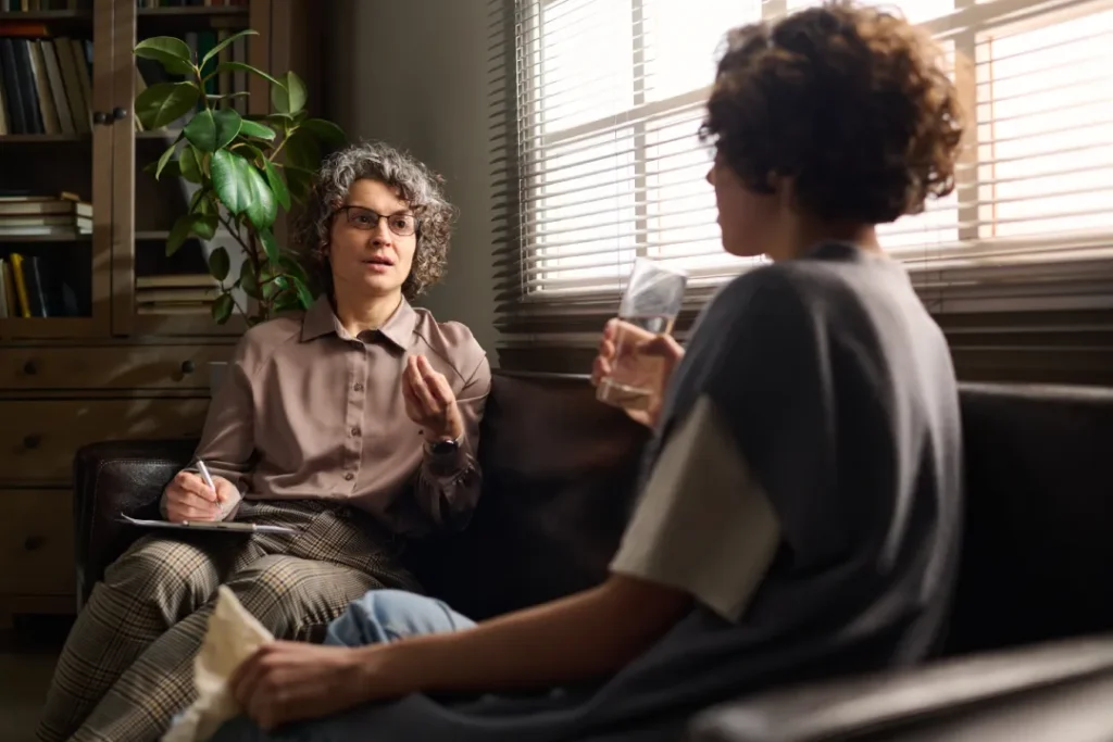 woman talking with therapist at a counseling sess | Detox California