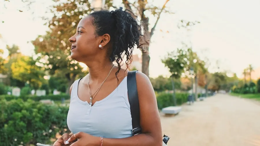 laughing young woman walking along path 2026 03 10 00 59 48 utc | Detox California